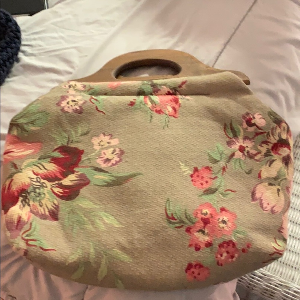 Wooden handled bag.